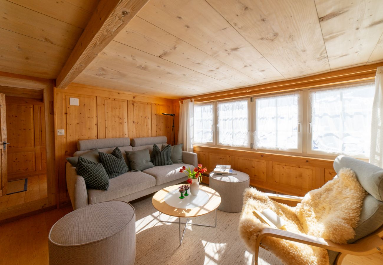 Coin salon confortable dans la maison de vacances Nüssli Maison à Wildhaus - Nüssli